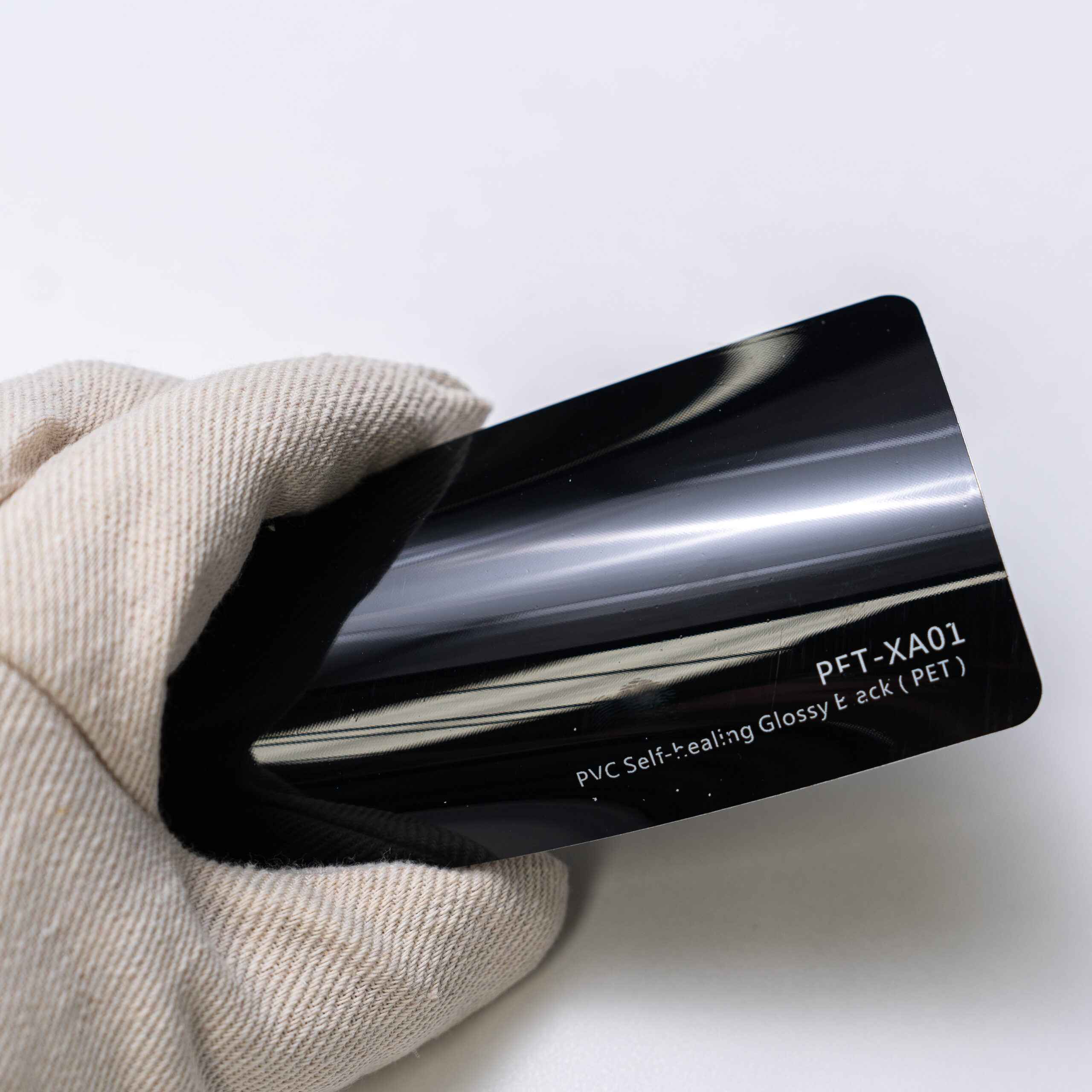 عکس محصول کاوربدنه مشکی پیانویی متری خود ترمیم براق PET